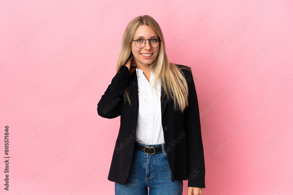 Business blonde woman isolated on pink background laughing Business blonde woman isolated on pink background laughing