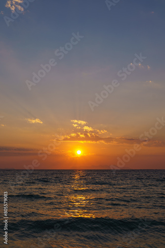 Fototapeta Naklejka Na Ścianę i Meble -  Sunset at Golden hour in the ocean