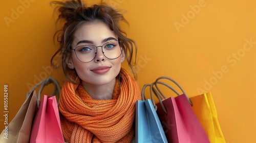 Woman With Glasses and Scarf Holding Shopping Bags