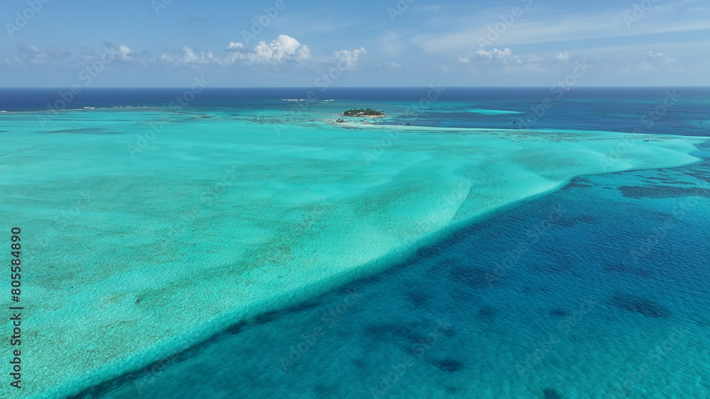 Obraz premium Blue Bay Water At San Andres In Caribbean Island Colombia. Colombian Caribbean Beach. Blue Sea Background. San Andres At Caribbean Island Colombia. Tourism Landscape. Nature Seascape.