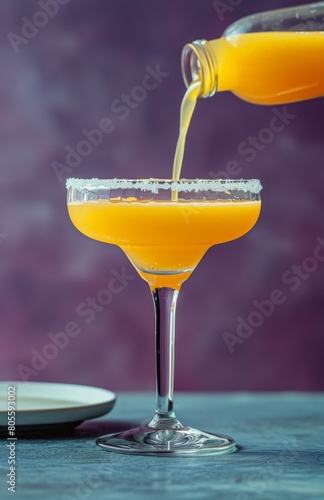 Glass Filled With Drink on Table