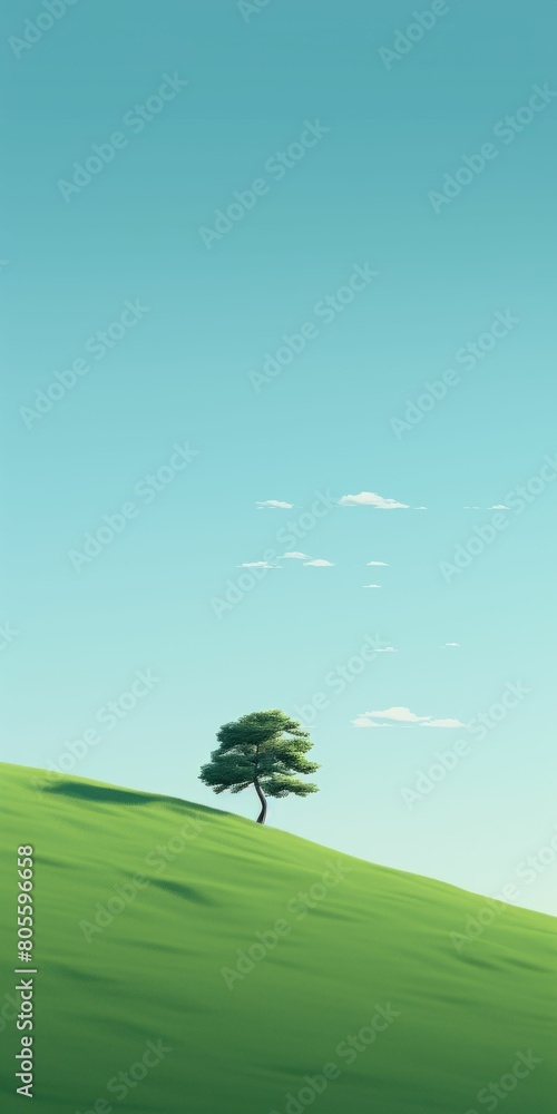 Fototapeta premium Lone Tree on Green Hill