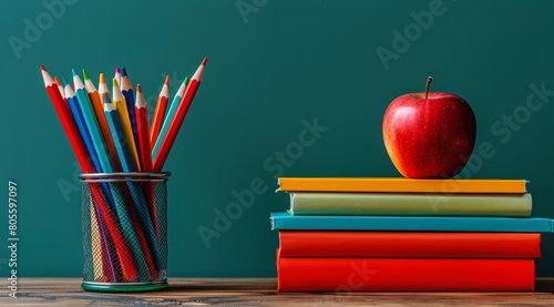 Books, Pencils, and Apple on Table