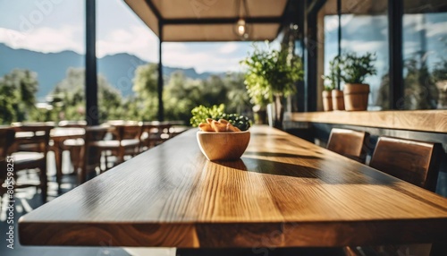 wooden table stands at forefront of blurred cafe interior embodying perfect of functionality and aesthetic allure smooth polished surface bathed in soft light invites array of products photo
