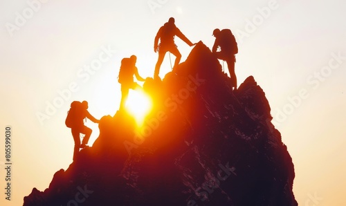 Group of people helping each other reach the top of mountain, symbolizing team unity and support during an adventure or business project.