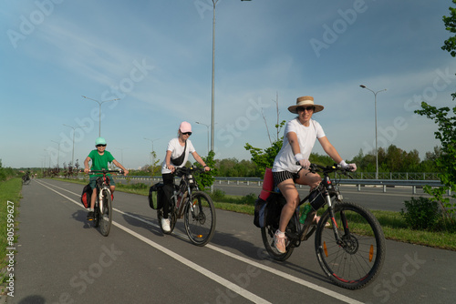 family riding a bike, family sport, teenagers riding a bike, cycling, traveling, traveling on a bike,