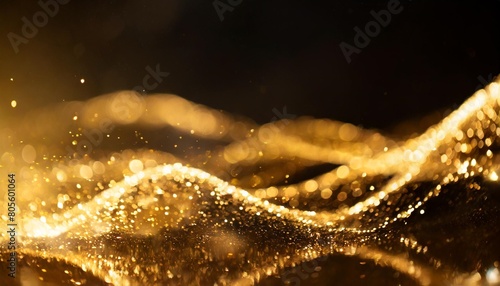 glistering bright sparks gold abstract light gold gold shining bac wave motion background shine gold magic shimmering glitter wave shimmer sparkles wave glow glow gold particles sparks glittering photo