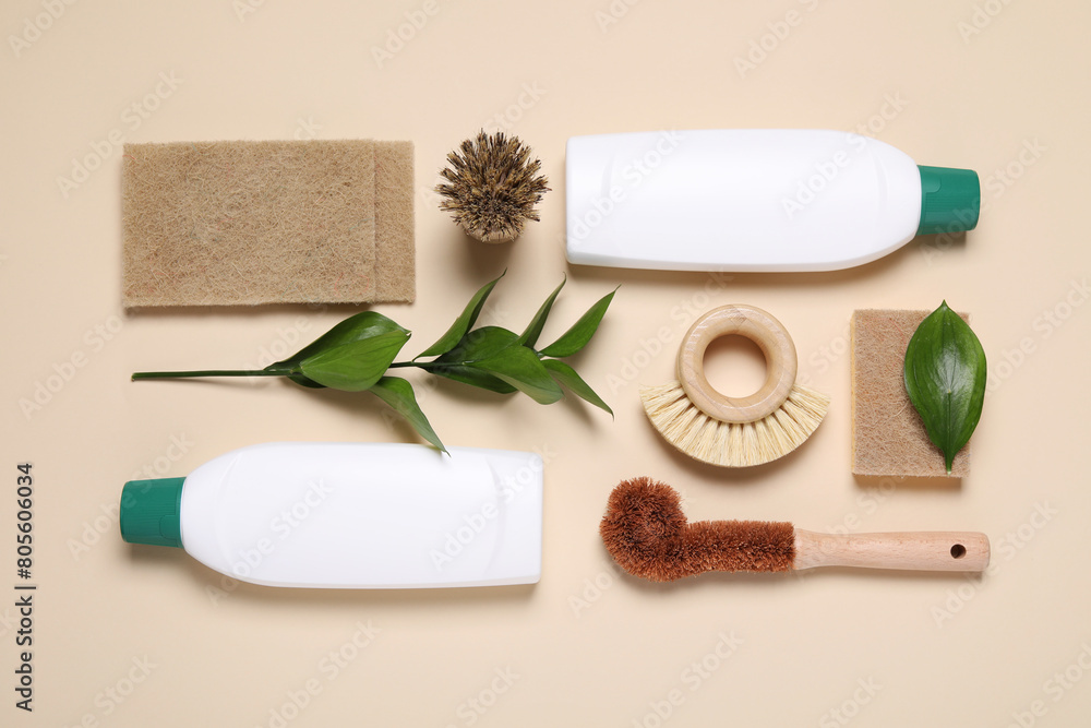 Flat lay composition with different cleaning supplies on beige background Flat lay composition with different cleaning supplies on beige background