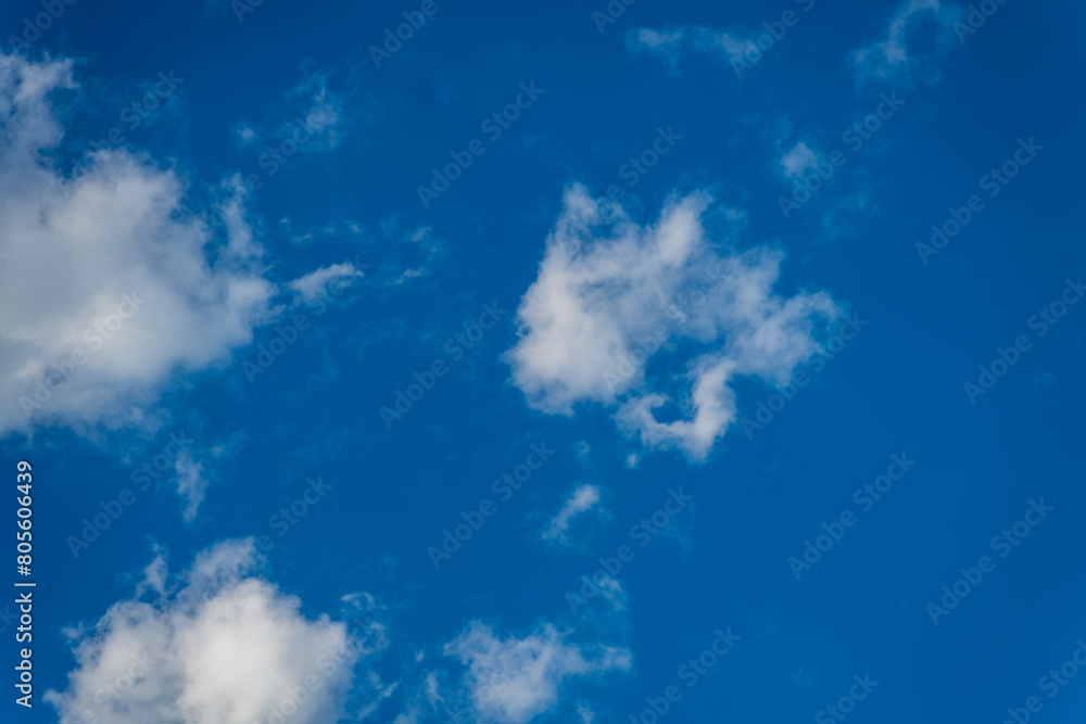 A bright blue sky full of clouds A bright blue sky full of clouds