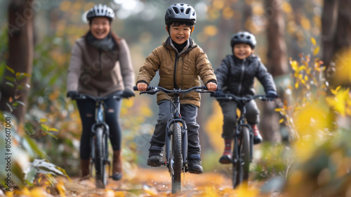 Group of People Riding Bikes Through Forest