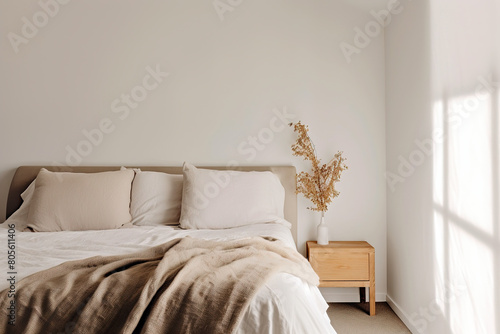 Bedroom interior. White room with natural wooden simplistic earth tones design. scandinavia Boho style with light from the window