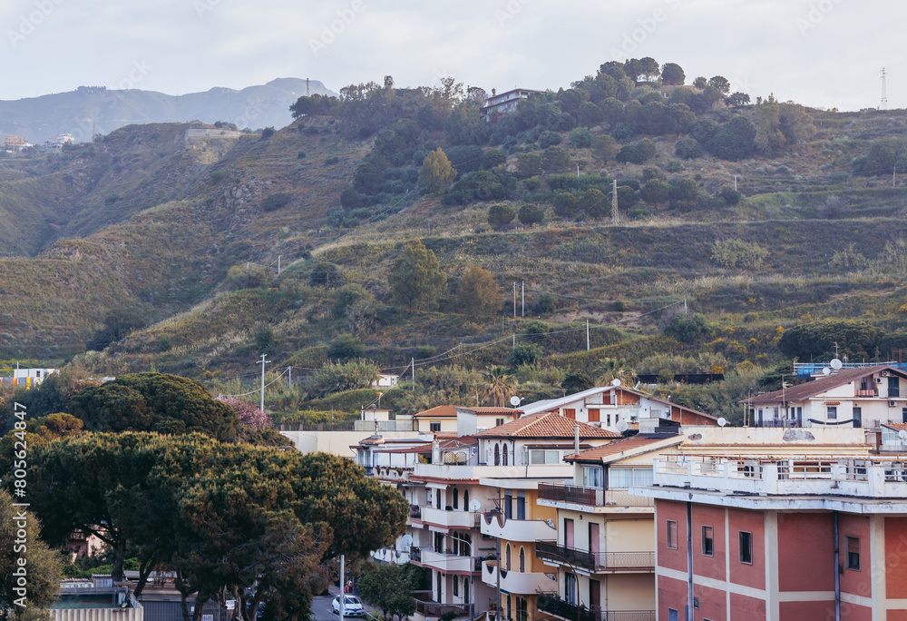 Buildings in Giardini Naxos in the Metropolitan City of Messina on the island of Sicily, Italy