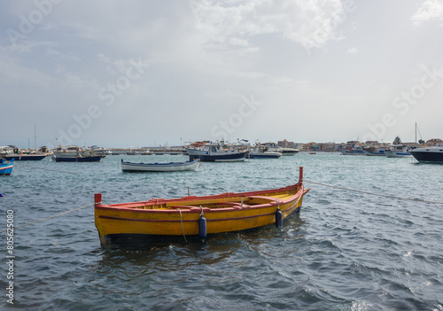 Yellow fishing boat in port of Marzamemi village on the island of Sicily  Italy