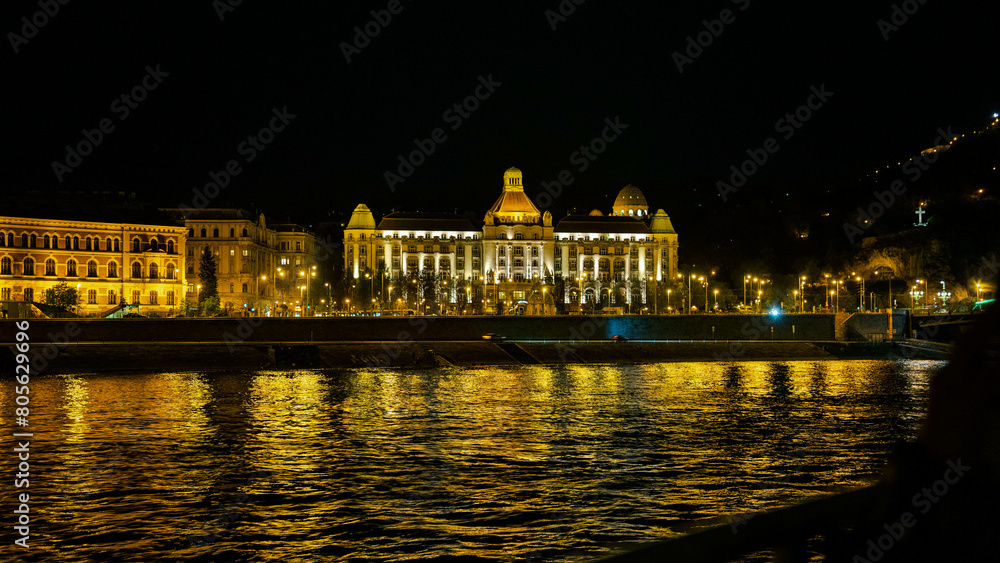 Building at night by the river in Budapest