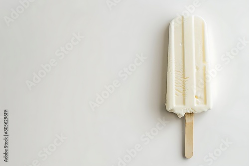 Milky white popsicle isolated on white background. vanilla ice-cream wallpaper, summer fresh banner, card with copy space