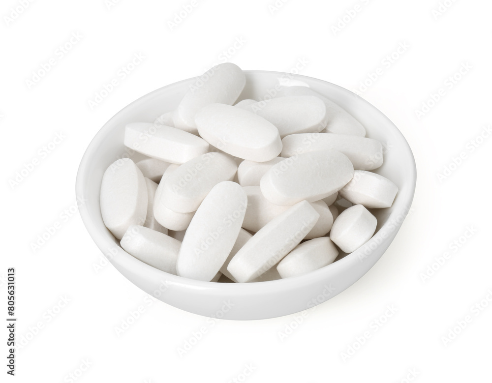 Vitamin pills in bowl isolated on white. Health supplement Vitamin pills in bowl isolated on white. Health supplement