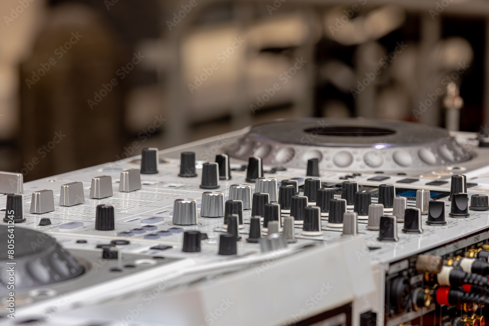 custom made wallpaper toronto digitalSelective focus of Professional DJ player, DJ mixer to play record players like a musical instrument and create new sounds, To control and manipulate multiple audio signals, Music and recreation.