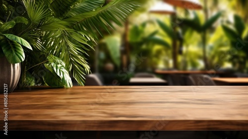 A wooden table with a potted plant on it