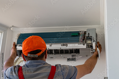 Repairman team installing air conditioner Lviv Ukraine 08.04.24