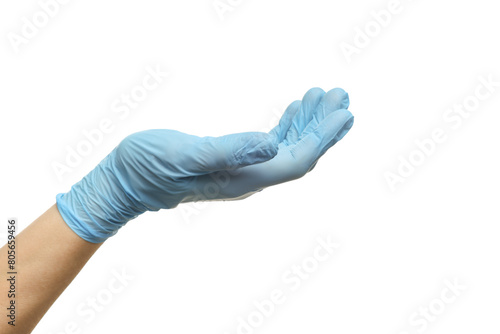 Doctor wearing light blue medical glove holding something on white background, closeup