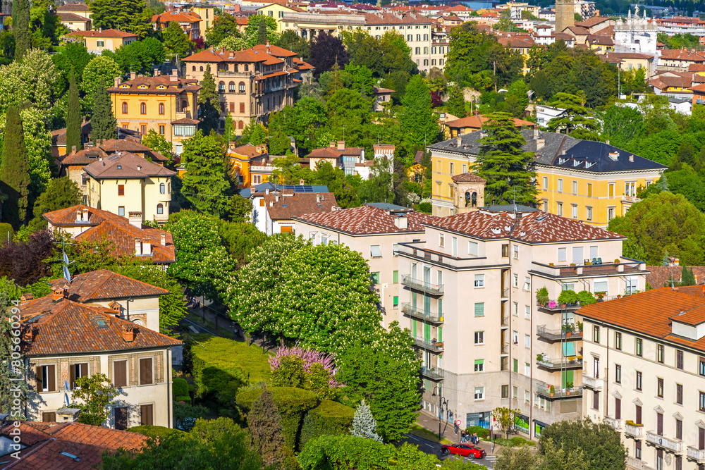Aerial skyline view of Bergamo city, Lombardy province, Italy. Picturesque spring view of residence buildings on Viale Vittorio Emanuele II and Via Antonio Locatelli