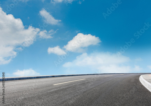 Graphic design asphalt background featuring an empty panoramic road