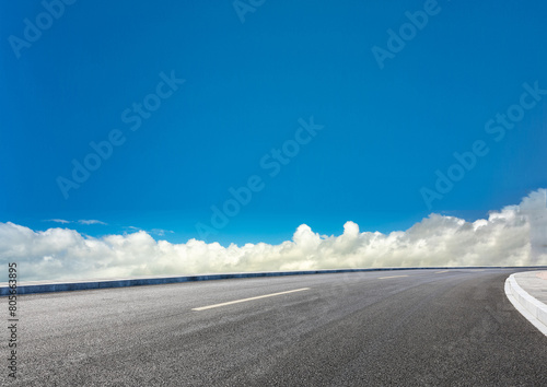 Graphic design asphalt background featuring an empty panoramic road