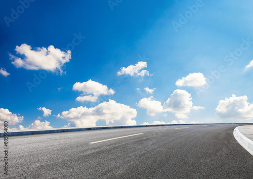 Graphic design asphalt background featuring an empty panoramic road