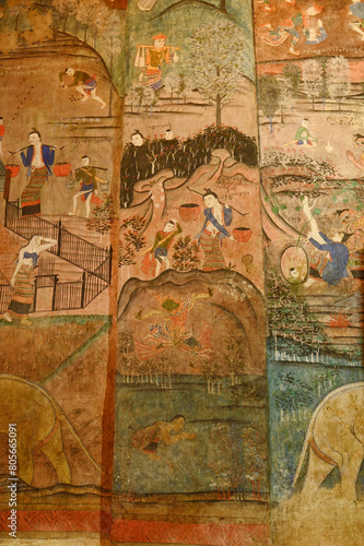 The ancient mural painting at the wall in Buddhist chruch of  Wat Phumin in Nan Province, Northern of Thailand.