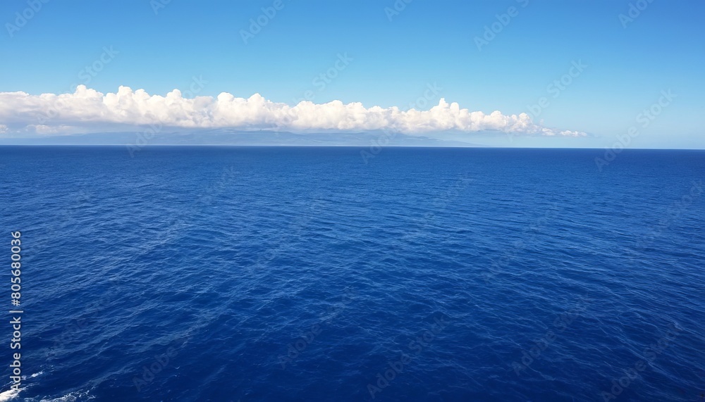 Obraz premium View of blue calm tropical ocean, blue clouds, summer composition, calm and beautiful summer landscape, Concept of travel, vacation, tourism, tour