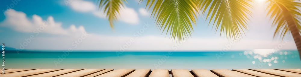 Obraz premium Sea coast and palm tree leafs background , banner with copy space - summer beach with ocean view, sand and waves, tropical travel and vacation concept