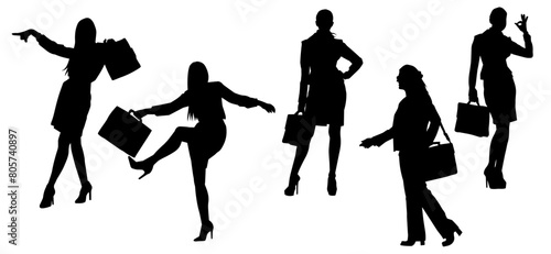 Silhouette of business woman carrying briefcase in expressive pose photo