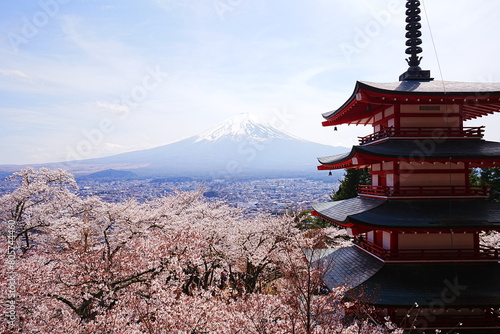 Mt. Fuji with Cherry Blossom and or Pink Sakura Flower and Five-story Pagoda over Blue Sky in Yamanashi, Japan - 日本 山梨県 新倉山浅間公園 春の桜 富士山 五重塔