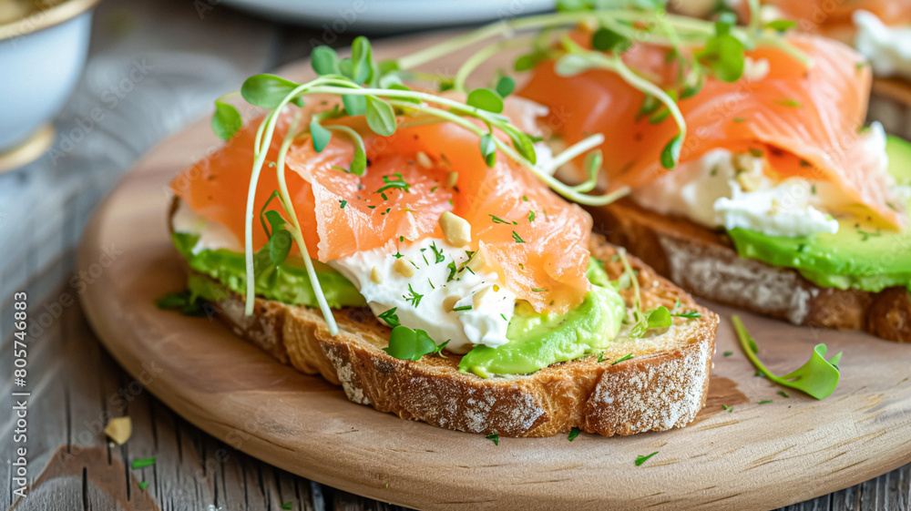 Avocado toast with smoked salmon for breakfast, homemade cuisine and traditional food, country life Avocado toast with smoked salmon for breakfast, homemade cuisine and traditional food, country life