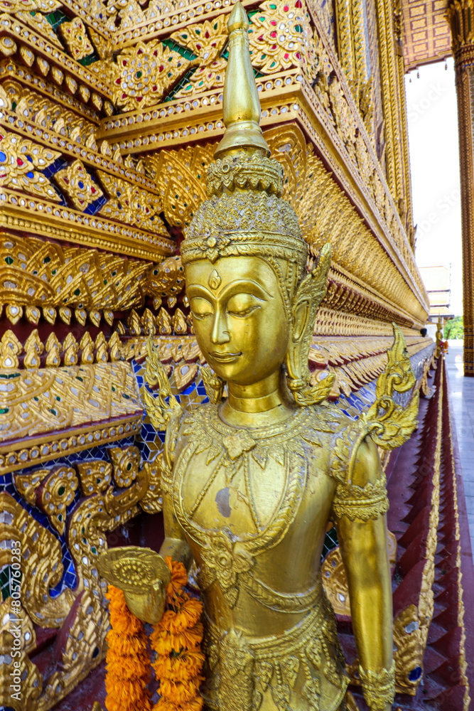 Statues of angels in Buddhist beliefs, Thai art in an old Buddhist temple that enshrines the Buddha's footprint of the Buddha symbol of holiness It is a pilgrimage site for Buddhists.