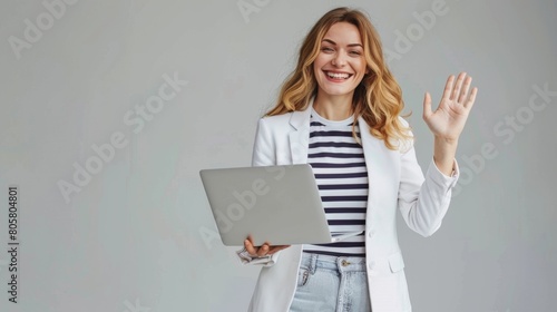 Smiling Woman Greeting with Laptop © MP Studio
