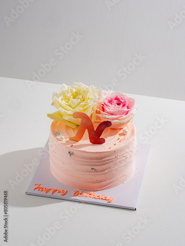 Delicious birthday cake with candle on light blue background.panoramic cover or banner concept. © Hide_Studio