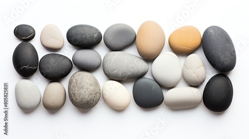 Elegant shot of a set of smooth river rocks  varying in size and shade of gray  meticulously isolated on a white background to emphasize simplicity and natural beauty.