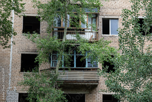 A resettled abandoned apartment building in the city center. photo