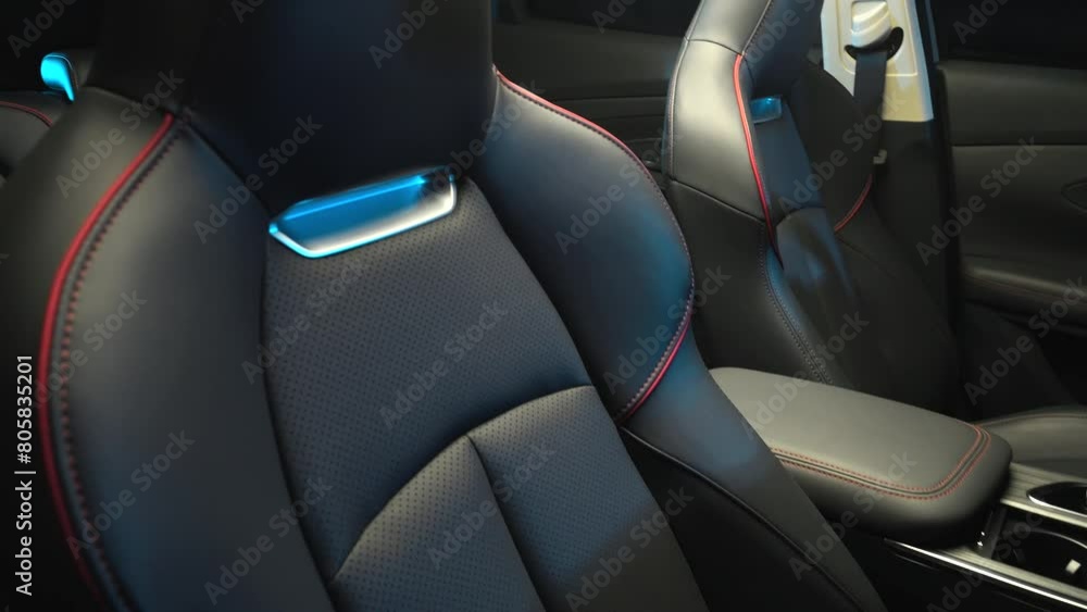 Car interior shot in a black studio. Artificial lighting. Slow camera movement Car interior shot in a black studio. Artificial lighting. Slow camera movement