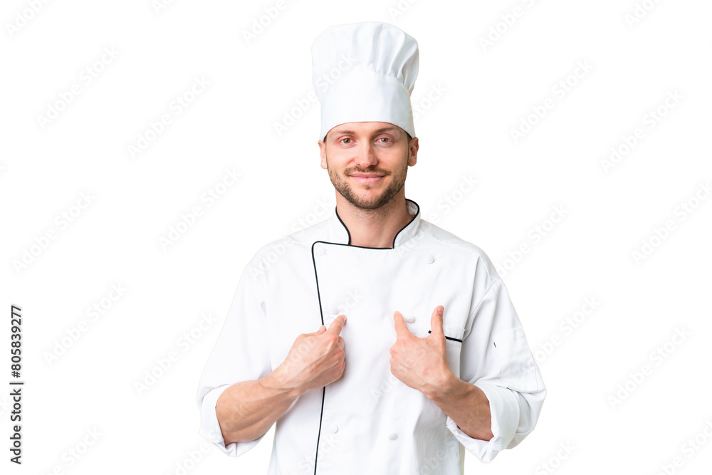 Young caucasian chef over isolated chroma key background with surprise facial expression