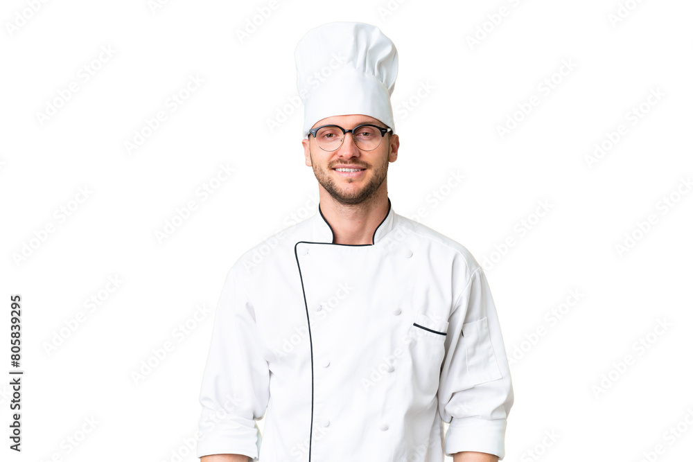 Young caucasian chef over isolated chroma key background with glasses and happy Young caucasian chef over isolated chroma key background with glasses and happy