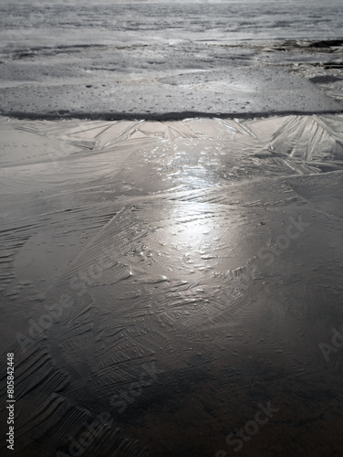 ice on frozen pond surface texture in early May  Finland