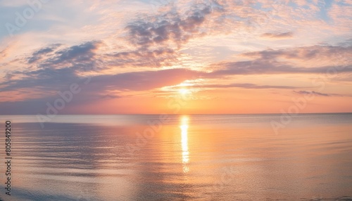 Serene sunset over calm ocean waters