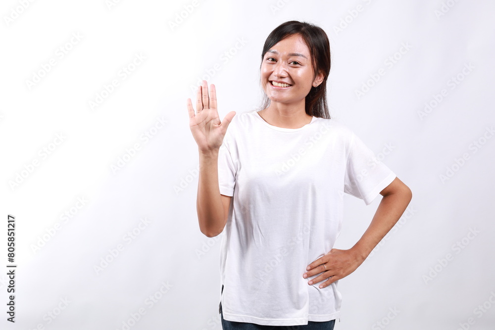 Smiling happy good-looking asian girl giving advice, showing five fingers as explain rules, make point, standing white background Smiling happy good-looking asian girl giving advice, showing five fingers as explain rules, make point, standing white background