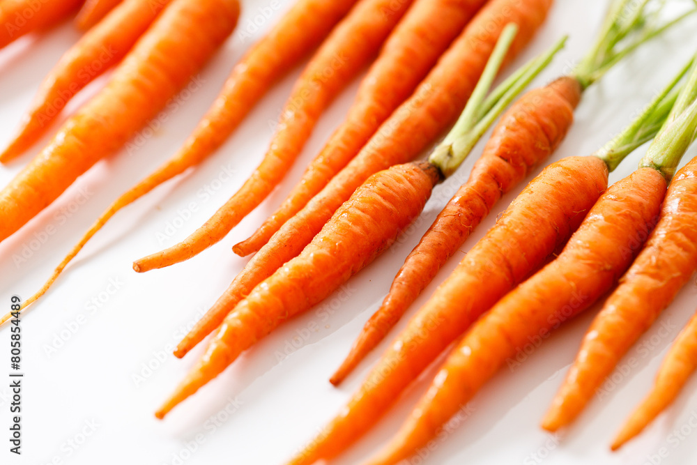 Fresh and sweet ripe orange carrot on white background Fresh and sweet ripe orange carrot on white background