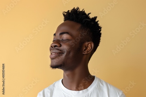 Joyful African American Man Smiling on Beige Background