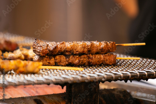 Photography Grilled yakitori chicken skewers at an Izakaya restaurant in Omoide Yokocho street in the Shinjuku district of Tokyo