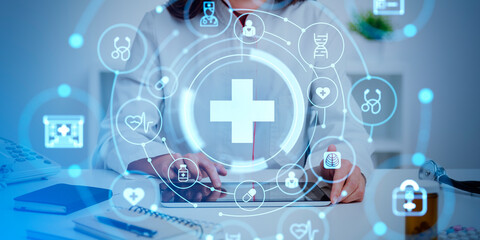 Woman doctor sitting with tablet, diverse medical icons and life insurance