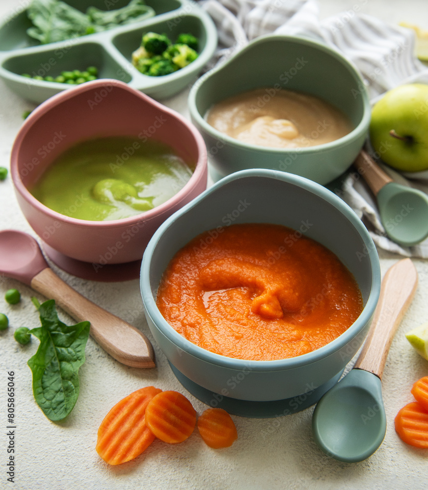 Healthy baby food in bowls Healthy baby food in bowls